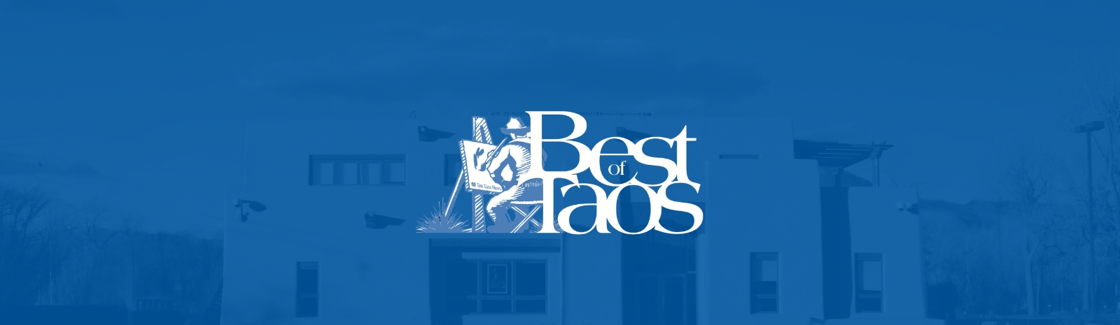 Main office building with Best of Taos logo